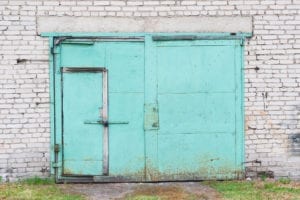 when to replace a damaged industrial door